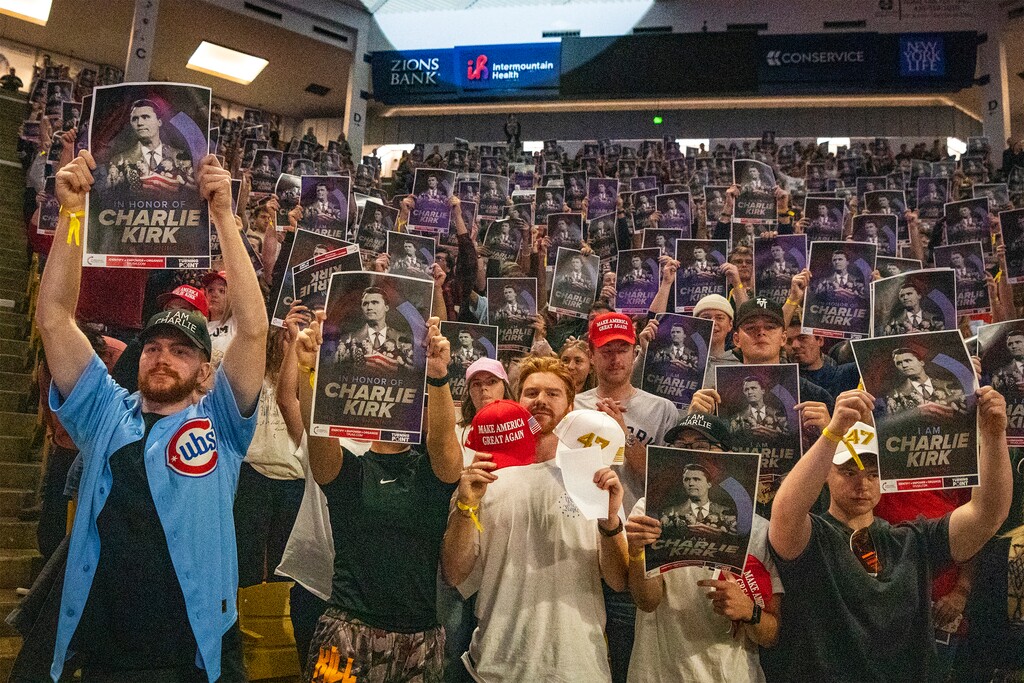 (Rick Egan | The Salt Lake Tribune) People raise Charlie Kirk signs during the Turning Point event in Logan on Tuesday, Sept. 30, 2025.

