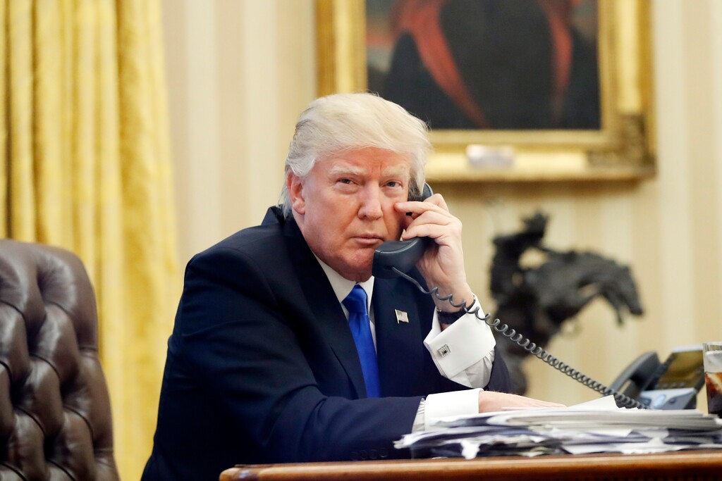 In this Jan. 28, 2017, file photo, U.S. President Donald Trump speaks on the phone with Prime Minister of Australia Malcolm Turnbull in the Oval Office of the White House in Washington. For decades, Australia and the U.S. have enjoyed the coziest of relationships, collaborating on everything from military and intelligence to diplomacy and trade. Yet an irritable tweet President Donald Trump fired off about Australia and a dramatic report of an angry phone call between the nations' leaders proves that the new commander in chief has changed the playing field for even America's staunchest allies. (AP Photo/Alex Brandon, File)