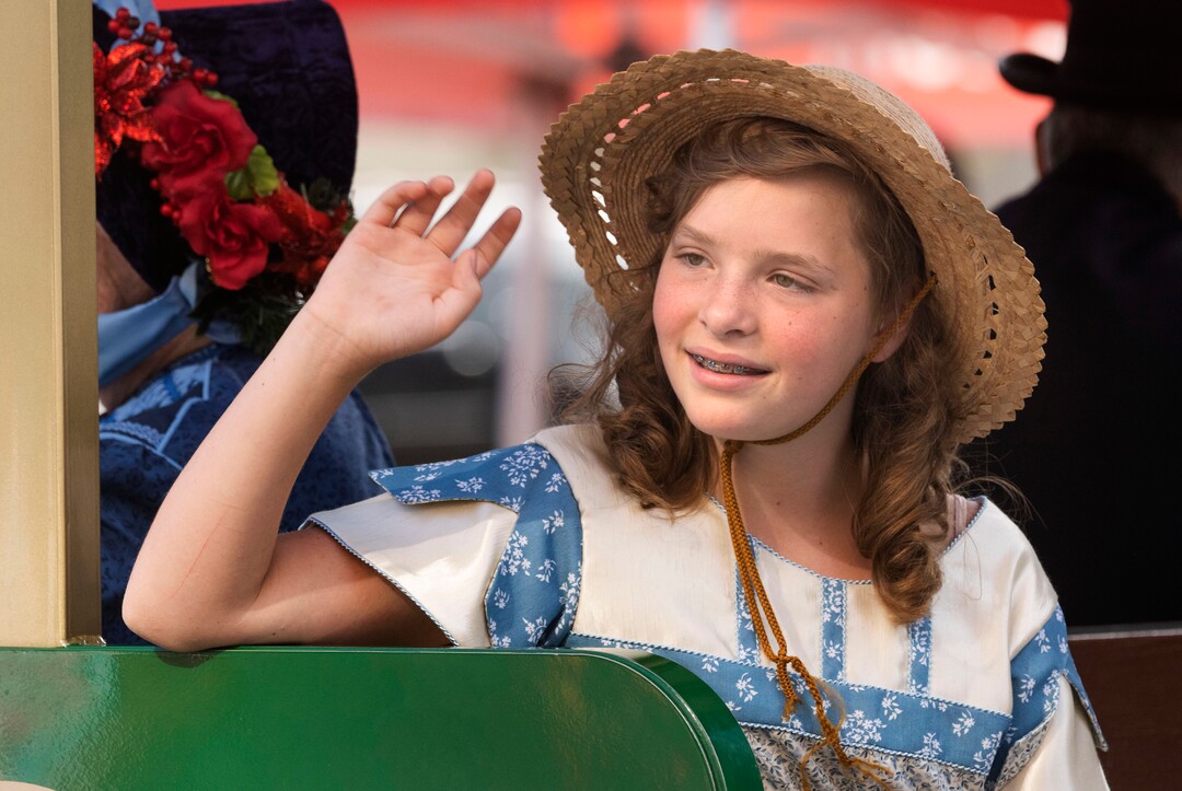 (Rick Egan | The Salt Lake Tribune) Emily Gabetias 10, waves to the crowd as she rides in a train from This is the Place Heritage Park, in the Days of '47 Parade, in Salt Lake City, on Friday, July 23, 2021.