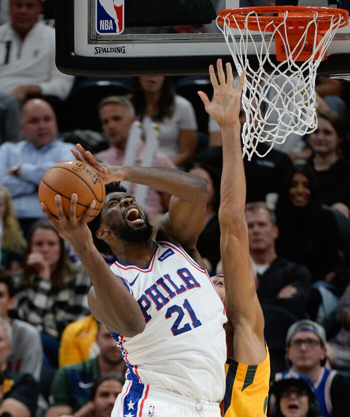 (Francisco Kjolseth  |  The Salt Lake Tribune)  Philadelphia 76ers center Joel Embiid (21) runs into the long reach of Utah Jazz center Rudy Gobert (27) as the Utah Jazz host the Philadelphia 76ers in their NBA basketball game at Vivint Smart Home Arena in Salt Lake City on Wed. Nov. 6, 2019.