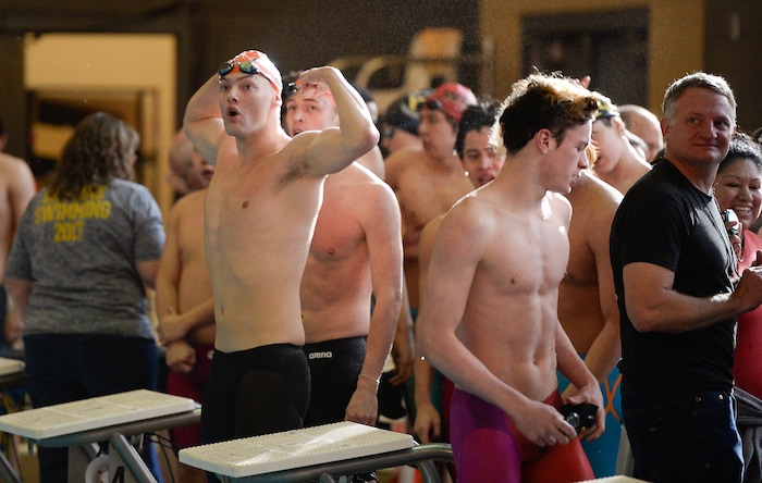 (Francisco Kjolseth | The Salt Lake Tribune) Bountiful celebrates their win in the 200 Yard Medley Relay at the high school swimming 5A State Championships in Bountiful, Friday February 9, 2018.
