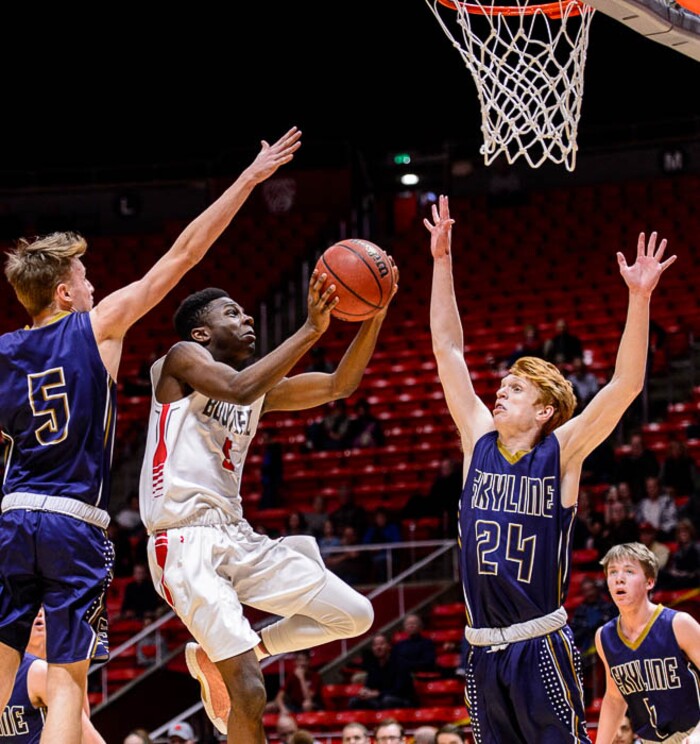 (Trent Nelson | The Salt Lake Tribune)  Skyline vs. Bountiful, 5A State high school basketball tournament at the Huntsman Center in Salt Lake City, Wednesday Feb. 28, 2018. Bountiful's Jaxon Wood (5) shoots between Skyline's Hollan Schweitz (5) and Skyline's Andrew Clark (24).