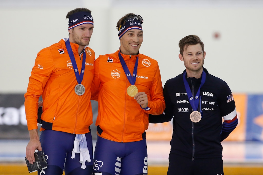Winner Kjeld Nuis, center, of the Netherlands celebrates with second-place finisher Thomas Krol, left, also of the Netherlands and third-place finisher Joey Mantia of the United States after competing in the men's 1,500 meters during the ISU World Single Distance Speed Skating Championships Sunday, Feb. 16, 2020, in Kearns, Utah. Mantia's bronze was the only medal won by Team USA at then four-day competition, the biggest of the season. (AP Photo/Rick Bowmer)