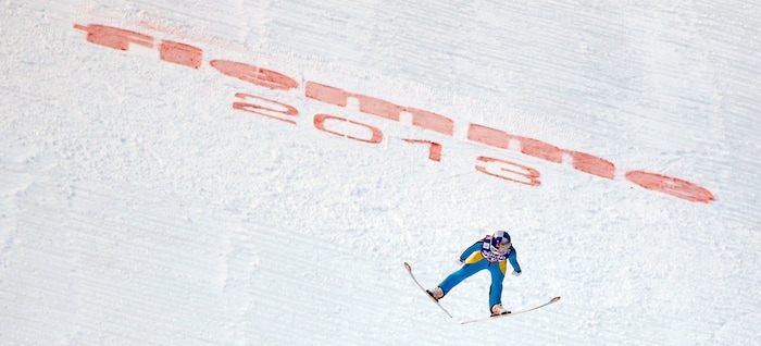 Sarah Hendrickson of the United States soars through the air to win the women's ski jumping HS 106 Individual at the Nordic Ski World Championships in Val di Fiemme, Italy, Friday, Feb. 22, 2013.  (AP Photo/Matthias Schrader)