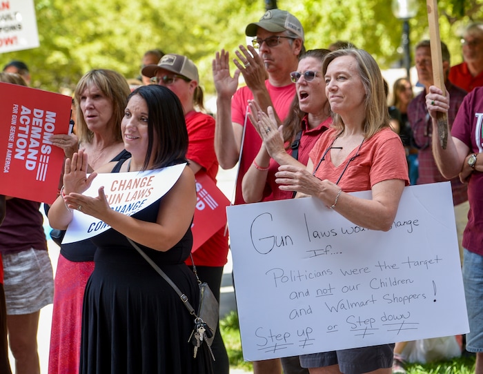(Leah Hogsten  |  The Salt Lake Tribune) Colleen Brady, right, and other supporters for changes in gun laws rally with Members of Moms Demand Action for Gun Sense in America, August 17, 2019 at Washington Square Park. The group wants change in gun laws in reaction to the August mass shootings in Dayton, Ohio and El Paso, Texas, and the hundreds of Americans who are wounded and killed by gun violence every day.