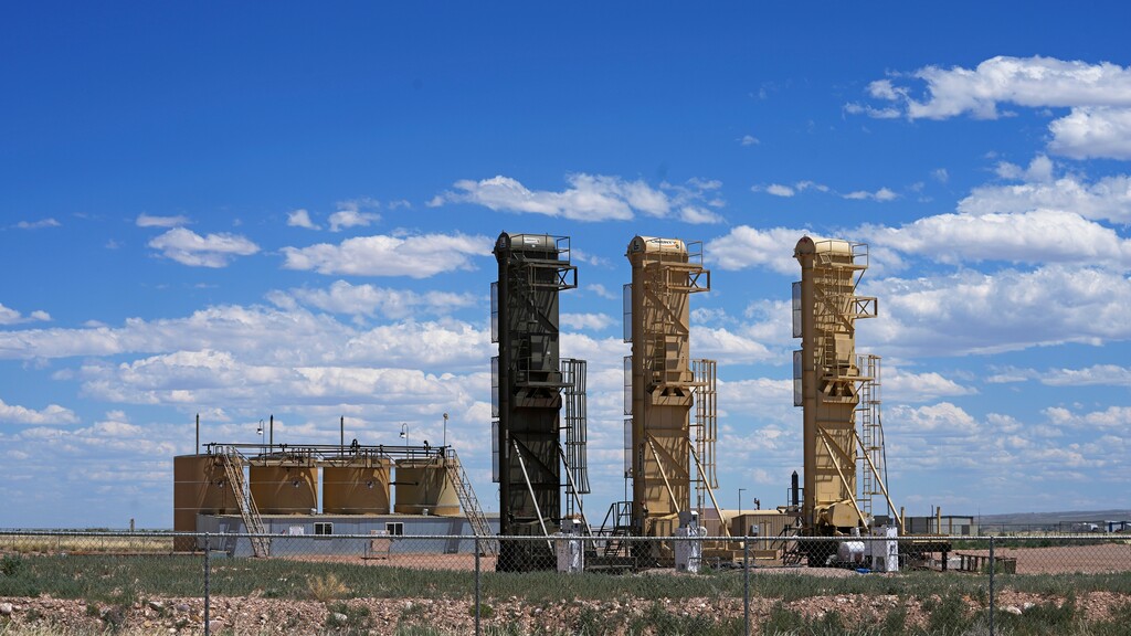 (Rick Bowmer | AP) Well pads used for horizontal drilling stand in the Uinta Basin near Duchesne on Thursday, July 13, 2023.