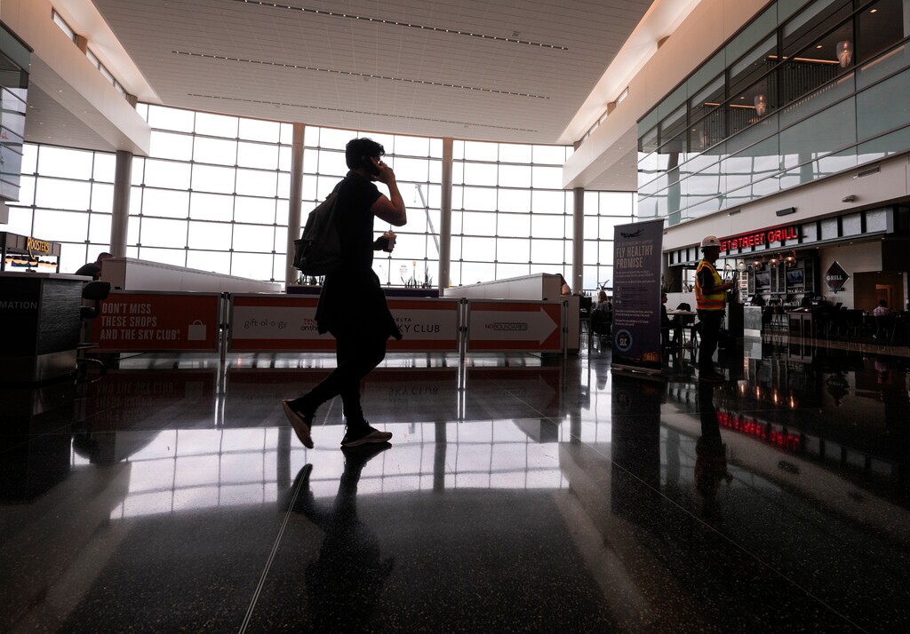 (Leah Hogsten | The Salt Lake Tribune) A man walks in Salt Lake City International Airport, as seen on Tuesday, Aug. 2, 2022. The airport's overhauled main terminal is Salt Lake City's most expensive piece of property, topping a list ranging from several hospitals and the new state prison to the Utah State Capitol.
