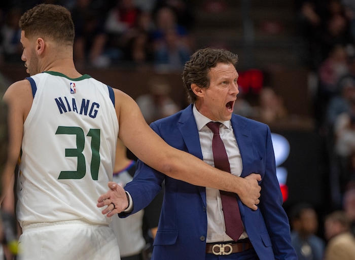 (Rick Egan  |  The Salt Lake Tribune)     Utah Jazz forward Georges Niang (31) restrains Utah Jazz head coach Quin Snyder after controversial call, in NBA action between the Utah Jazz and the Washington Wizards, in Salt Lake City, Friday, February 28, 2020