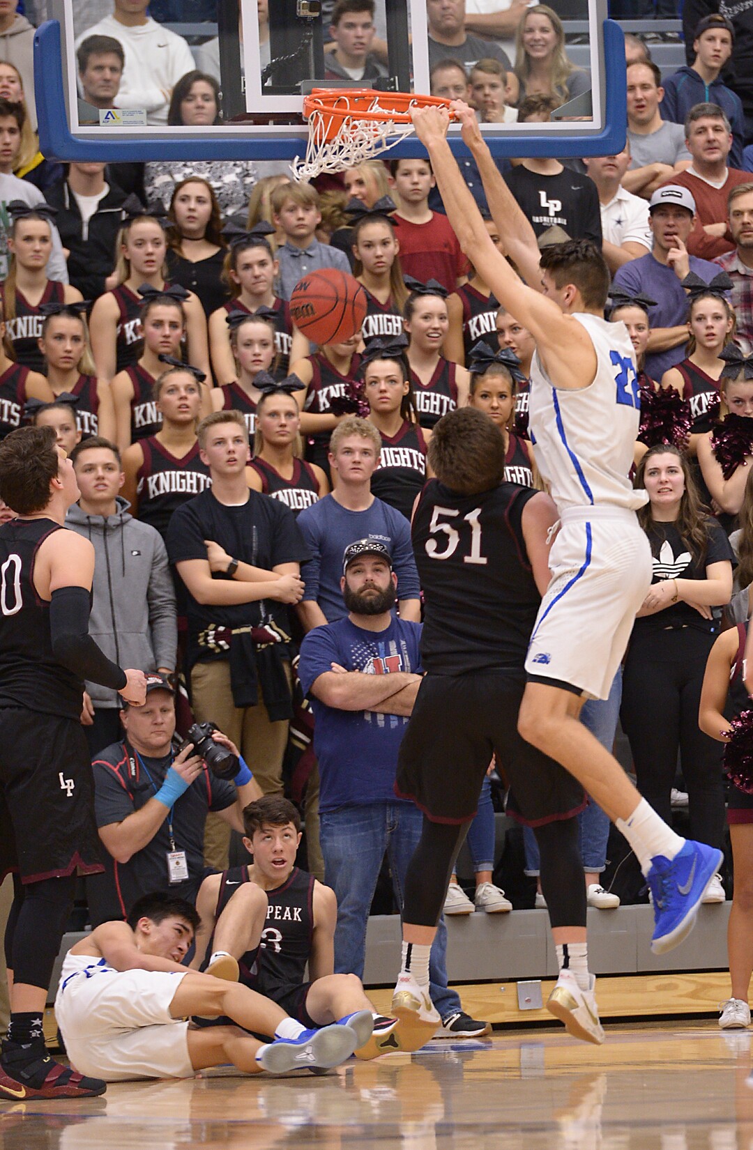 (Leah Hogsten  |  The Salt Lake Tribune) Pleasant Grove's Matt Van Komen with the dunk. High School boys' basketball team leads Lone Peak High School 26-20 during their game Friday, January 26, 2018 in Pleasant Grove. 