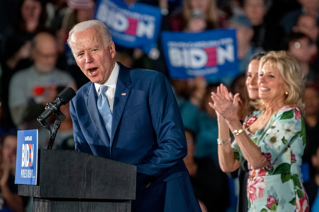 (Tom Gralish | The Philadelphia Inquirer via AP file photo) Democratic presidential candidate and former Vice President Joe Biden speaks as his wife Jill Biden, far right, and daughter Ashley stand by during his primary election night rally in Columbia, S.C., Saturday, Feb. 29, 2020, after winning the South Carolina primary.
