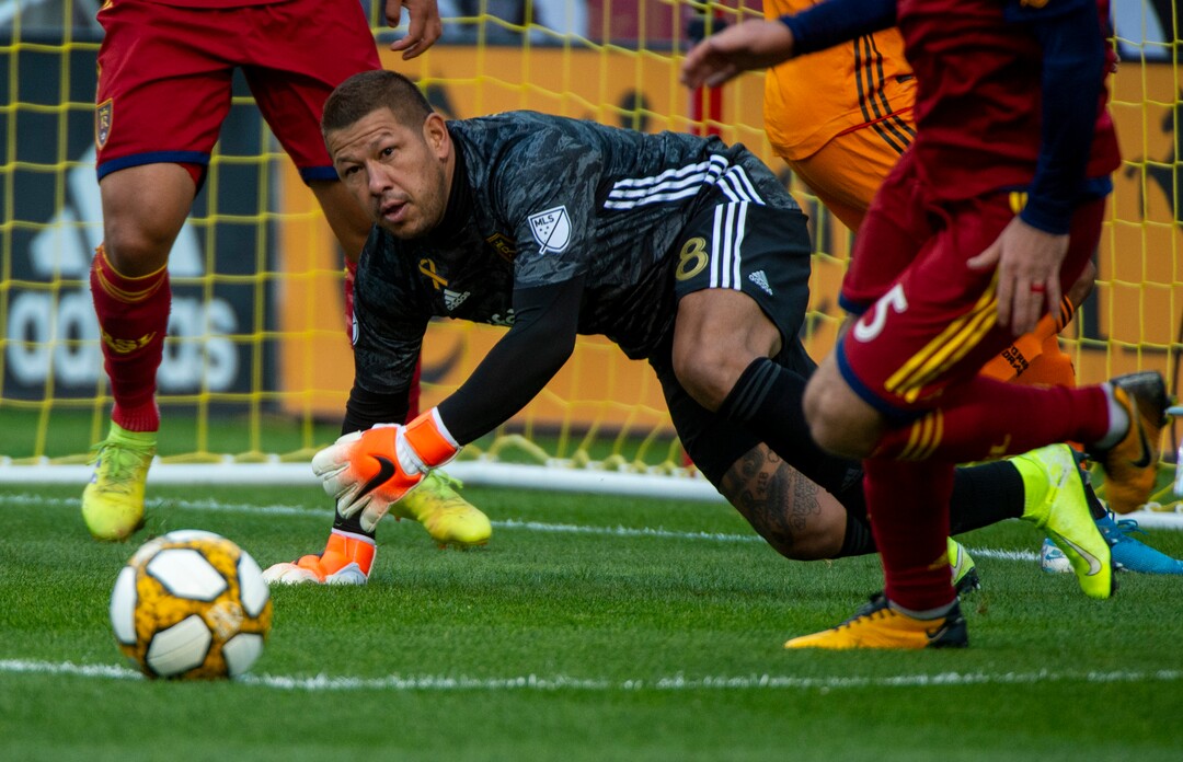 (Rick Egan  |  The Salt Lake Tribune)      Real Salt Lake goalkeeper Nick Rimando (18) deflects the ball, in MLS action at Rio Tinto Stadium, Sunday, Sept. 29, 2019.