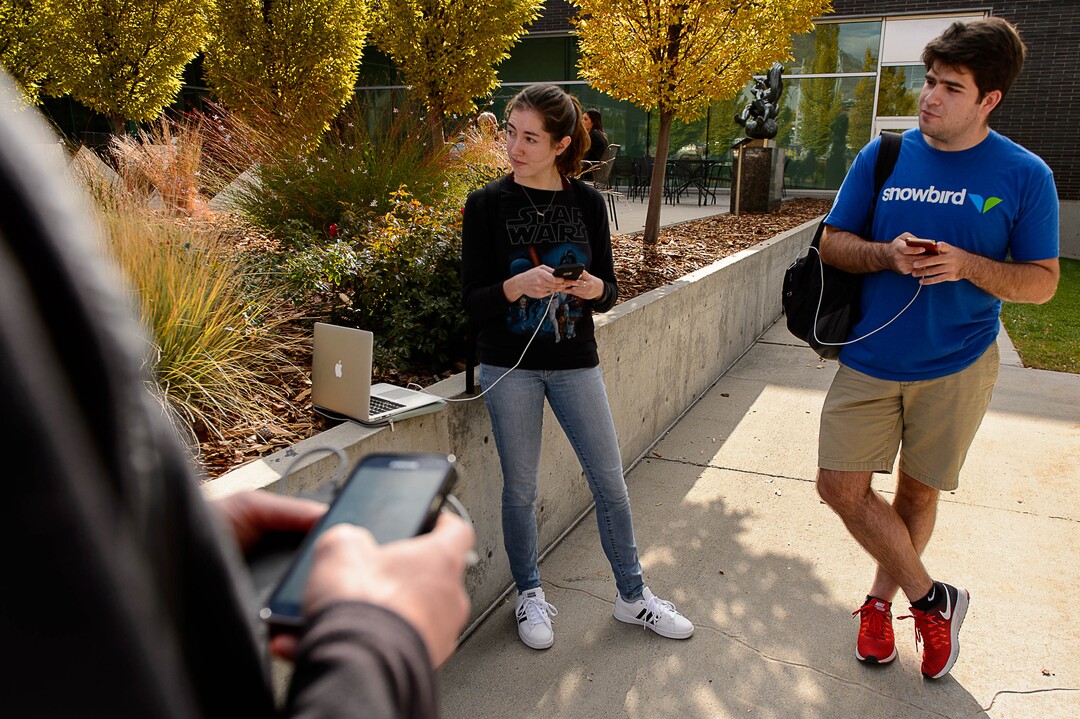 (Trent Nelson | The Salt Lake Tribune)  Nickie Zenes and Andrew Moore participate in a Pokemon Go raid with other players at the University of Utah in Salt Lake City on Thursday, Oct. 19, 2017.