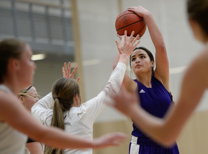 (Francisco Kjolseth  |  The Salt Lake Tribune)  Kaitlin Toluono, a junior guard with Westminster College women's basketball team spots her mark as she runs through drills with teammates during a recent practice. 