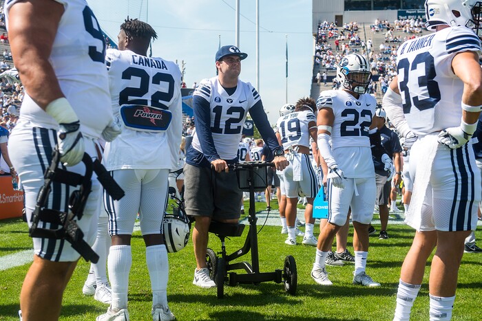 (Chris Detrick  |  The Salt Lake Tribune)   Brigham Young Cougars quarterback Tanner Mangum (12) watches practice before the game at LaVell Edwards Stadium Saturday Saturday, September 16, 2017. 