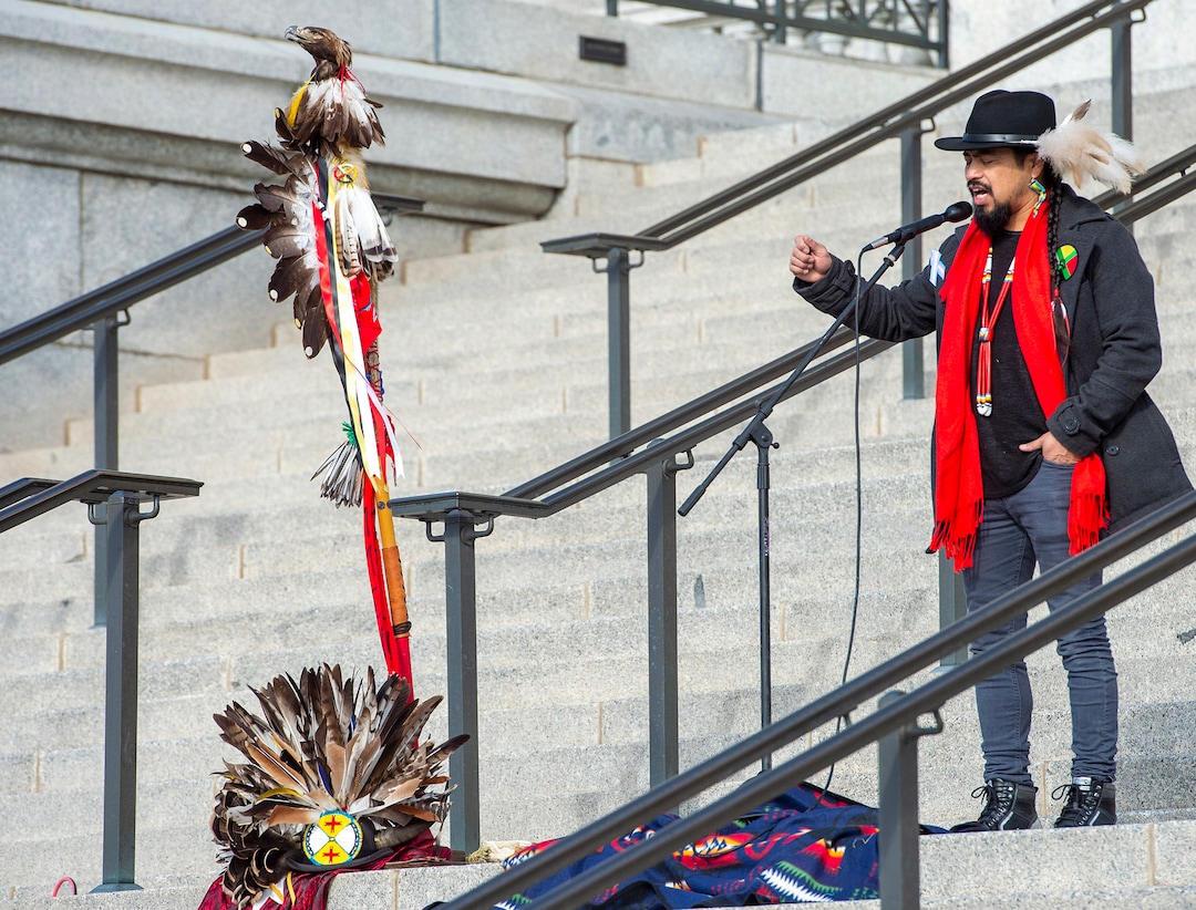 (Rick Egan  |  The Salt Lake Tribune)     Carl Moore, from the Salt Lake City Air Protectors, sings a buffalo song as Native Americans and their supporters gather on the steps of the Utah State Capitol for a rally to oppose a resolution that would discourage the removal of Native American names or symbols from school mascots, Saturday, Jan. 25, 2020.