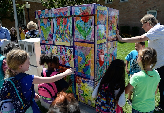(Francisco Kjolseth  |  The Salt Lake Tribune)  Salt Lake City schools alongside Bennion Elementary school kids and Mayor Jackie Biskupski unveil the final phase of its ColorSLC program, on Tuesday, Aug. 20, 2019, in which artwork from each of the district's elementary schools decorated utility boxes near each school.