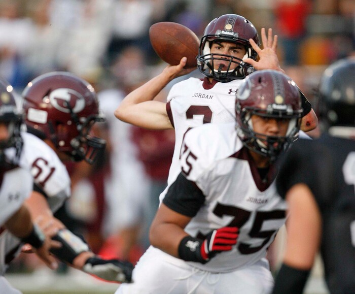 (Trent Nelson  |  The Salt Lake Tribune)  Jordan quarterback Austin Kafentzis throws the ball. Alta vs. Jordan High School football in Sandy, Utah, on Friday, September 16, 2011.
