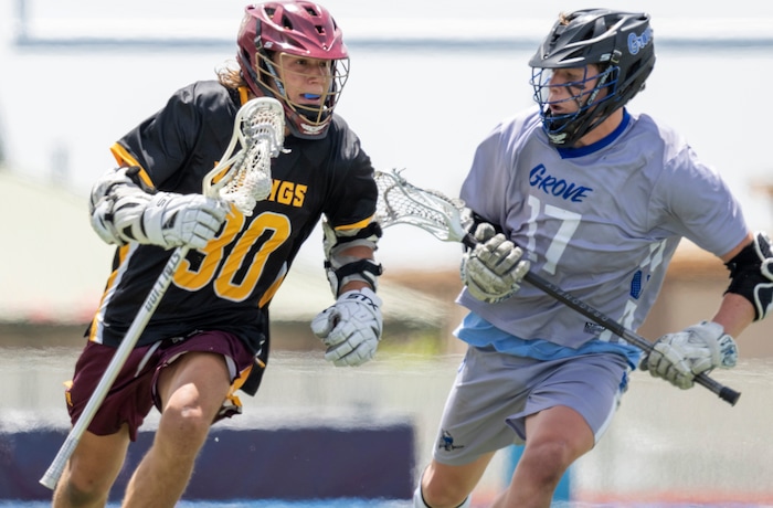 (Rick Egan | The Salt Lake Tribune)Mason Hepworth (30), Viewmont, runs with the ball, as Pleasant Grove defender Evan Robinson (17) defends, in the Division C championship game between the Viewmont Vikings and the Pleasant Grove Vikings, in Layton, on Saturday, May 29, 2021.