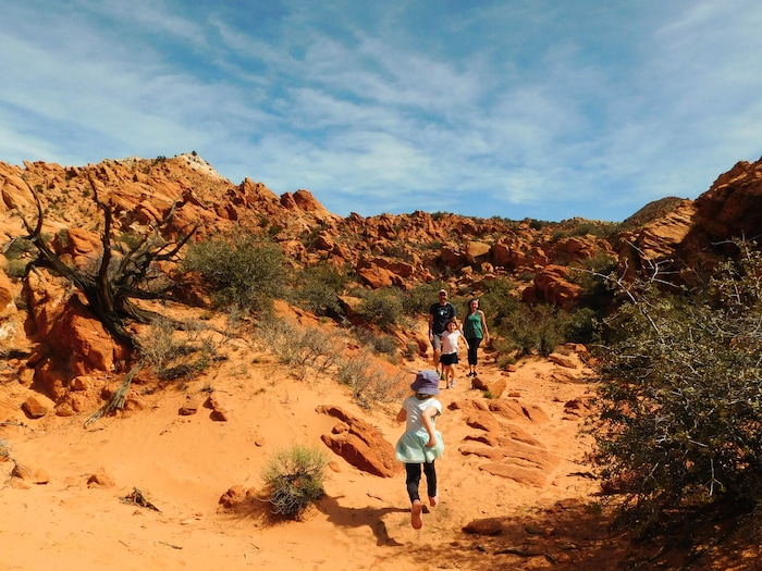 (Erin Alberty|The Salt Lake Tribune) The author's daughter, Saskia Buschmann, greets Imogen Nesse, 6, on March 12, 2017 for an afternoon searching for the mythical Trail Troll at Sand Cove near St. George. The "Trail Troll" drops gummy worms along the trail — but not if it hears whining children. Imogen's parents, Will Nesse and Melissa Helquist follow.