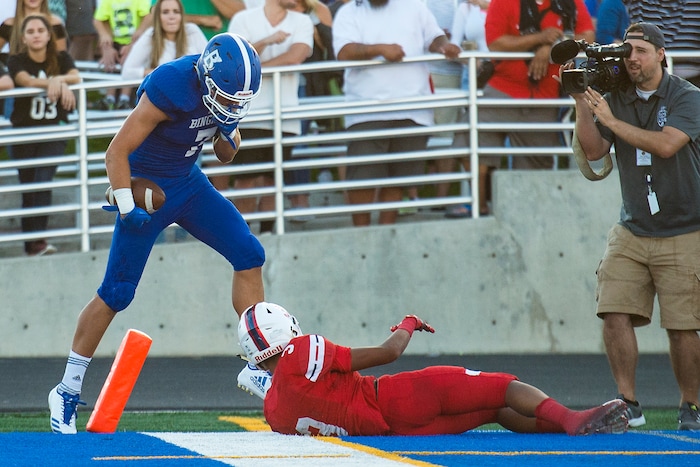 (Chris Detrick  |  The Salt Lake Tribune)  Bingham's Brayden Cosper (7) taunts East's Mekelee Gautavai (3) during the game at Bingham High School Friday, August 25, 2017. Bingham is winning the game 24-17 at halftime. 