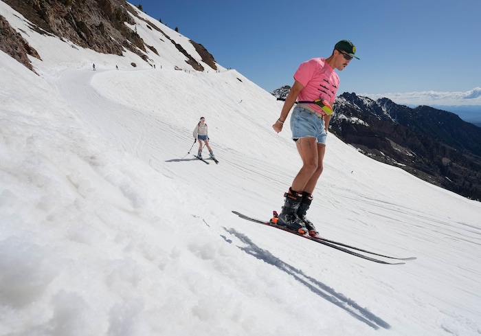 (Francisco Kjolseth  | The Salt Lake Tribune) Skiers hit Mineral Basin as Snowbird closes the book on the 2024-25 ski season on Monday, May 26, 2025. Snow and sun revelers took to the slushy slopes on Memorial Day as the resort was the last in the state to close.