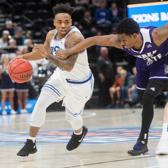 (Rick Egan  |  The Salt Lake Tribune)  Weber State Wildcats guard Jerrick Harding (10) tries to stop Brigham Young Cougars guard Jahshire Hardnett (0), in Beehive Classic basketball action at the Vivint SmartHome Arena, Saturday, December 9, 2017.
