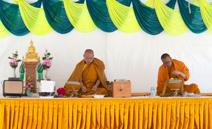 (Rick Egan  |  The Salt Lake Tribune)    The monks eat their daily meal, at the Wat Lao Salt Lake Buddharam Utah, New Year Celebration, in West Valley City, Sunday, April 28, 2019.


