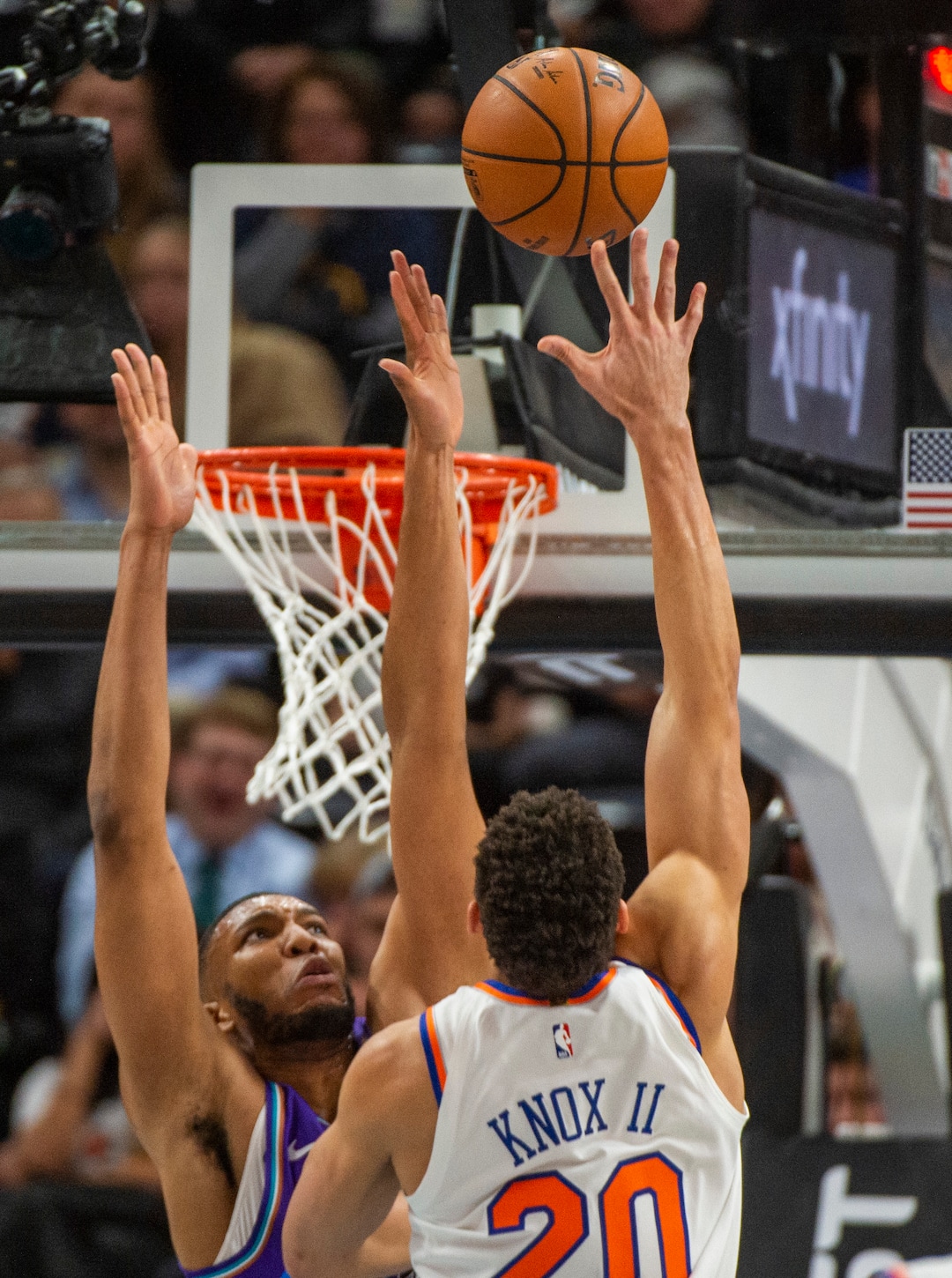 (Rick Egan  |  The Salt Lake Tribune)    New York Knicks forward Kevin Knox II (20) shoots over Utah Jazz guard Rayjon Tucker (12), in NBA action between the Utah Jazz and the New York Knicks, in Salt Lake City, Wednesday, Jan. 8, 2020.