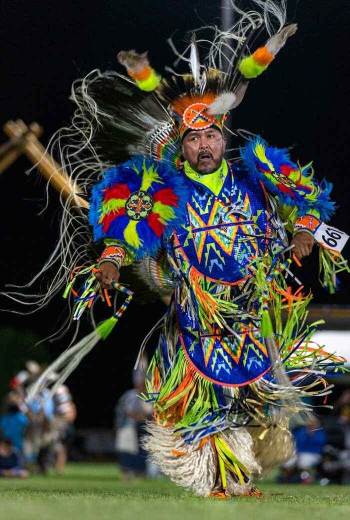 (Leah Hogsten | The Salt Lake Tribune Dancers are a whirl of regalia and color at the 41st Annual Paiute Indian Tribe of Utah Restoration Gathering, Aug. 13, 2021 in Cedar City, Utah.