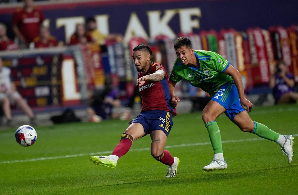 (Francisco Kjolseth | The Salt Lake Tribune) Real Salt Lake forward Chicho Arango (9) gets past Seattle Sounders defender Jackson Ragen (25) as he scores a goal during the second half of a Leagues Cup soccer match Saturday, July 22, 2023, in Sandy, Utah. RSL won 3-0.