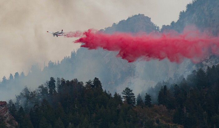 (Francisco Kjolseth  |  The Salt Lake Tribune) Air crews battle a fire in Neffs Canyon on the north side of Mount Olympus on Tuesday, Sept, 22, 2020.