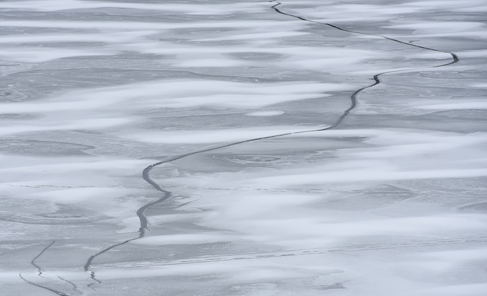 (Francisco Kjolseth | The Salt Lake Tribune) Cracks form on the ice at Echo Reservoir in Summit County next to Coalville which could soon become a state park.