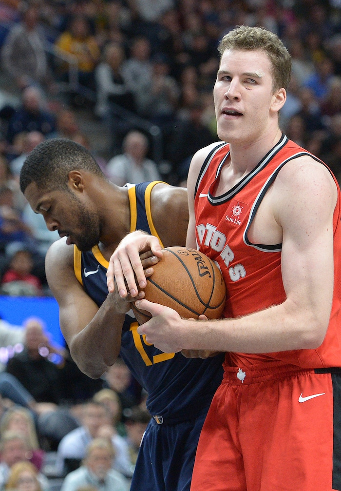 (Leah Hogsten  |  The Salt Lake Tribune) Utah Jazz forward Derrick Favors (15) battled Toronto Raptors center Jakob Poeltl (42). The Utah Jazz were defeated by the Toronto Raptors 100-109 at Vivint Smart Home Arena, Friday, November 3, 2017