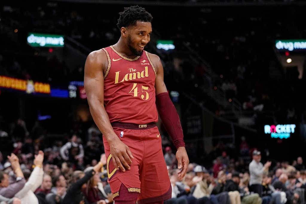 Cleveland Cavaliers guard Donovan Mitchell (45) smiles in the second half of an In-Season Tournament NBA basketball game against the Atlanta Hawks, Tuesday, Nov. 28, 2023, in Cleveland. (AP Photo/Sue Ogrocki)