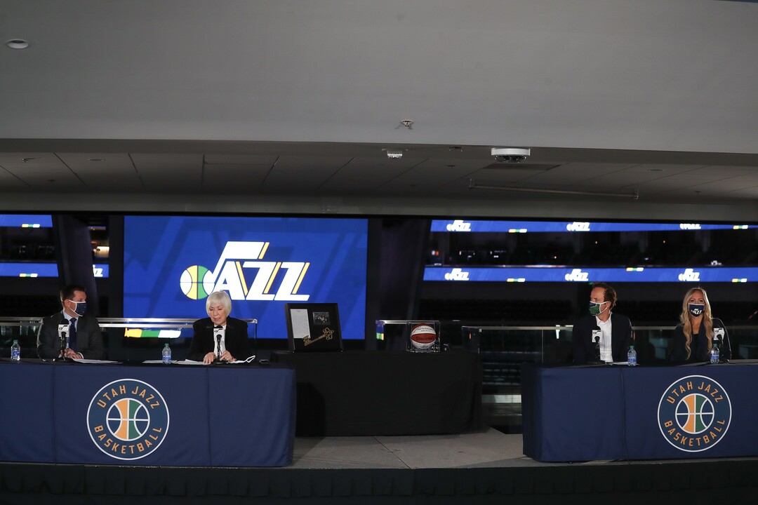 (Photo courtesy Utah Jazz/Melissa Majchrzak) Gail Miller, at the left, owner and chair of the Larry H. Miller Group of Companies and the Utah Jazz speaks at a news conference where she announced agreements to sell a majority interest in the Utah Jazz and other sports to Ryan and Ashley Smith, right, at vivint.SmartHome Arena on October 28, 2020 in Salt Lake City, Utah.