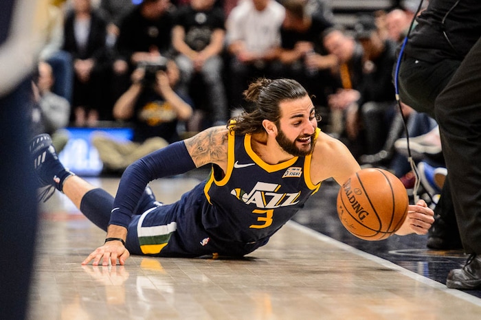 (Trent Nelson | The Salt Lake Tribune)  
Utah Jazz vs. Boston Celtics, NBA basketball in Salt Lake City, Wednesday March 28, 2018. Utah Jazz guard Ricky Rubio (3) dives for a loose ball.