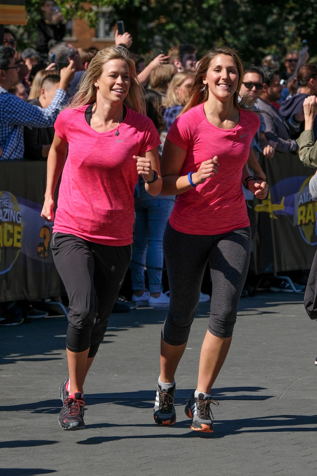 (Photo courtesy of Timothy Kuratek/CBS) Skiers Kristi Leskinen (left) and Utahn Jen Hudak make their way to the starting line in the iconic Washington Square Park in New York City in the premiere of the 30th season of “The Amazing Race” on Wednesday, Jan. 3, at 7 p.m. on CBS/Ch. 2.