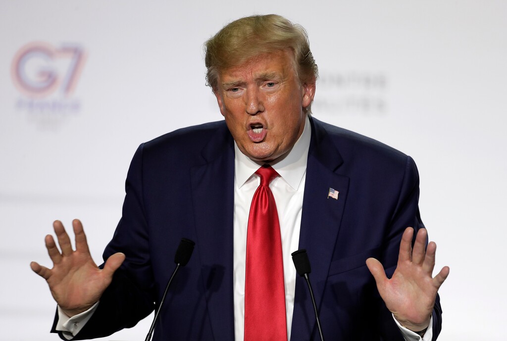 (Markus Schreiber | AP) President Donald Trump talks during a press conference on the third and final day of the G-7 summit in Biarritz, France on Monday, Aug. 26, 2019.