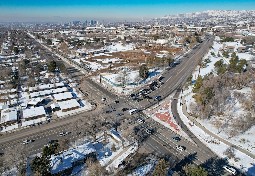 (Francisco Kjolseth | The Salt Lake Tribune) Traffic moves along Foothill Dr. and Sunnyside Ave. in Salt Lake City on Tuesday, Dec. 21, 2021, as the city and UDOT plan to make it more pedestrian-friendly and reduce the amount of time vehicles spent idling at red lights on the increasingly busy thoroughfare. Part of the reconstruction will get rid of the big right turn onto northbound Foothill and replace it with a regular turn lane.