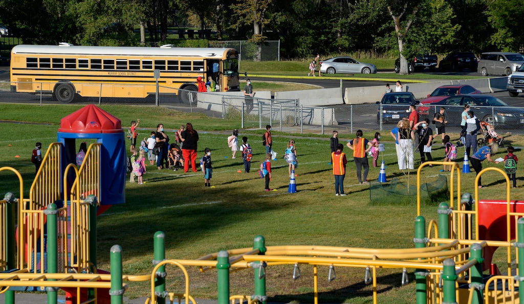 (Francisco Kjolseth | The Salt Lake Tribune) Parkside Elementary School kids are spaced apart as they line up on the school field before heading inside on Monday, August, 17, 2020. The Utah Board of Education oversees all public K-12 schools in the state, and there are nine seats up for election in November.