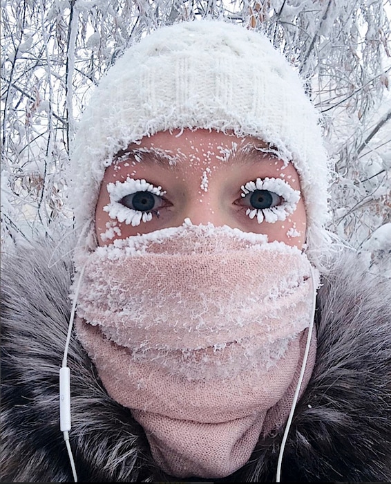 In this photo taken on Sunday, Jan. 14, 2018, Anastasia Gruzdeva poses for selfie as the Temperature dropped to about -50 degrees (-58 degrees Fahrenheit) in Yakutsk, Russia. Temperatures in the remote, diamond-rich Russian region of Yakutia have dropped to near-record lows, plunging to -67 degrees Centigrade (-88.6 degrees Fahrenheit) in some areas. (sakhalife.ru photo via AP)