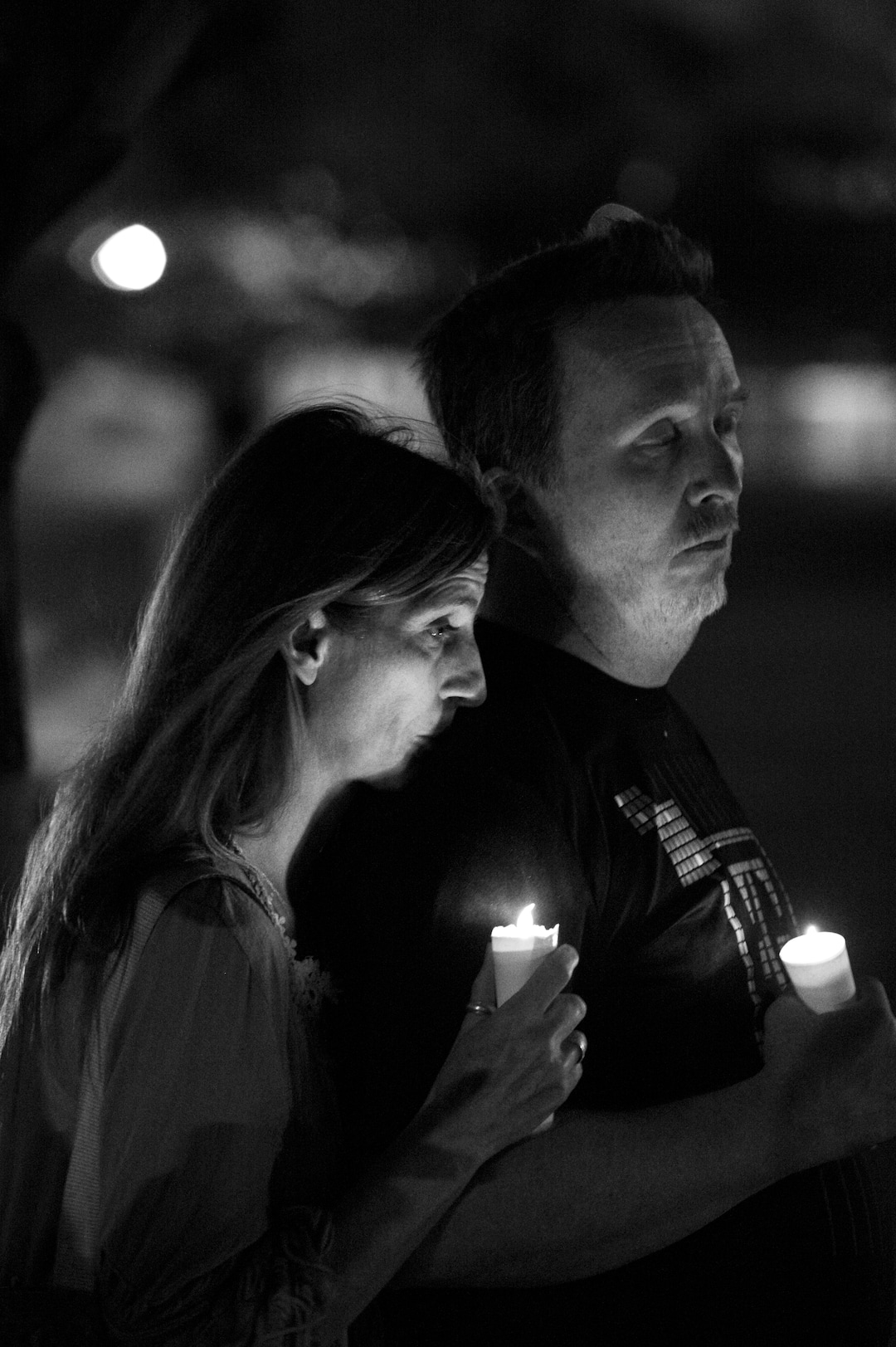 (Leah Hogsten  |  The Salt Lake Tribune)  Nancy Rountree and her husband Danny Neds hold candles for their daughter, Ivy, 14, who has Type 1 diabetes. Diabetes patients, their families and supporters rallied for those struggling with the high cost of insulin and paid tribute to those who have died from the disease on the Capitol lawn, Saturday, Sept. 7, 2019.