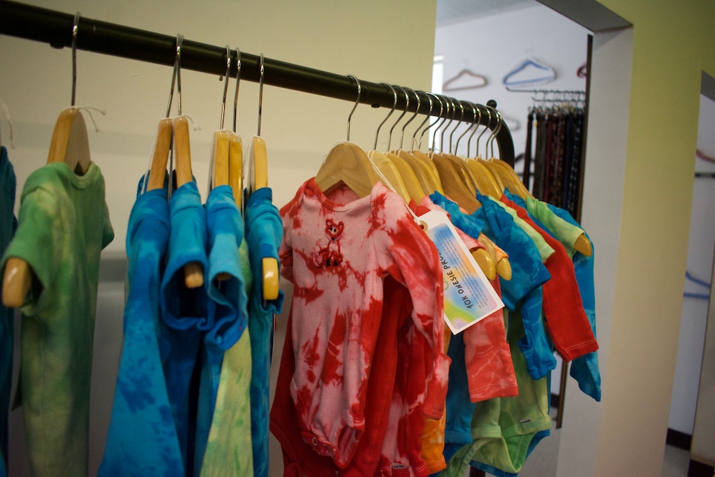 (Clarissa Casper | The Salt Lake Tribune) Used baby onesies collected as part of erthaware’s 10,000 Onesies Project in Logan.