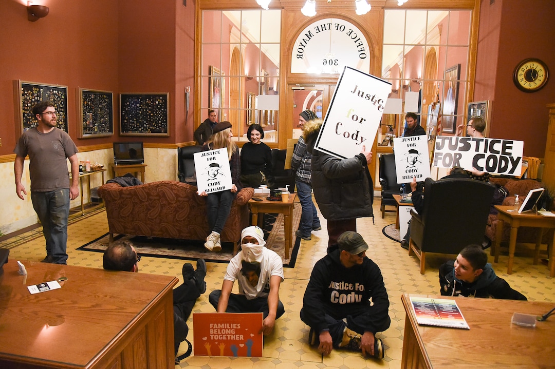 (Francisco Kjolseth  |  The Salt Lake Tribune)  Utah Against Police Brutality and members of Cody BelgardÕs family, the popular Glendale rapper, who was shot by police last November, hold a sit-in at Mayor Jackie Biskupski's office after members of her staff went home for the day on Thursday, Jan. 10, 2019. For weeks, the family of Cody Belgard has asked to meet with Mayor Biskupski to discuss his shooting by SLCPD last November, to no avail.