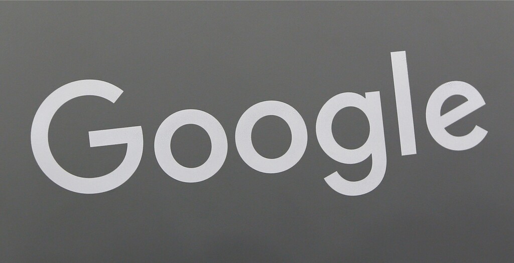 This Monday, Aug. 7, 2017, photo shows a Google sign at a store in Hialeah, Fla. A lawyer representing three female former Google employees is filing a class action lawsuit against the search giant for gender pay discrimination. The suit follows a federal labor investigation into Google that has preliminarily found systemic pay discrimination among the 21,000 employees at Google’s headquarters in Mountain View, Calif. The initial stages of the review found women earned less than men in nearly every job classification. (AP Photo/Alan Diaz)