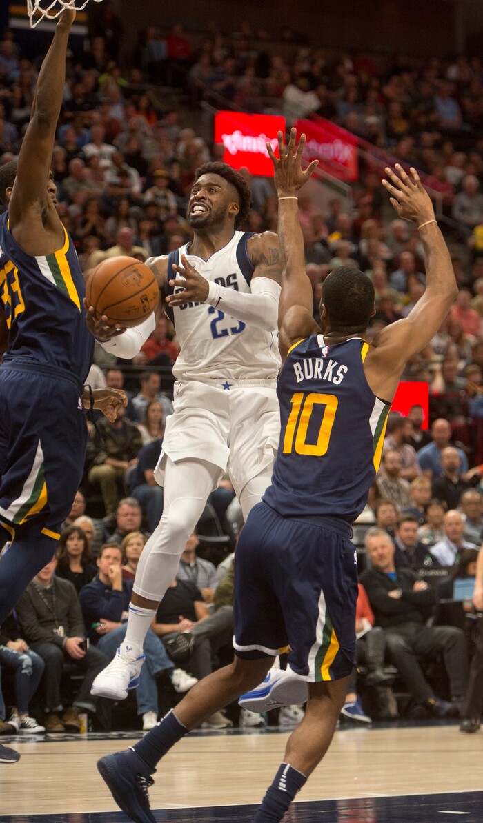 (Rick Egan  |  The Salt Lake Tribune) Dallas Mavericks guard Wesley Matthews (23)tries to get to the hoop, as Utah Jazz forward Ekpe Udoh (33)and Utah Jazz guard Alec Burks (10) defend, in NBA action Utah Jazz vs. Dallas Mavericks, in Salt Lake City, Monday, October 30, 2017.