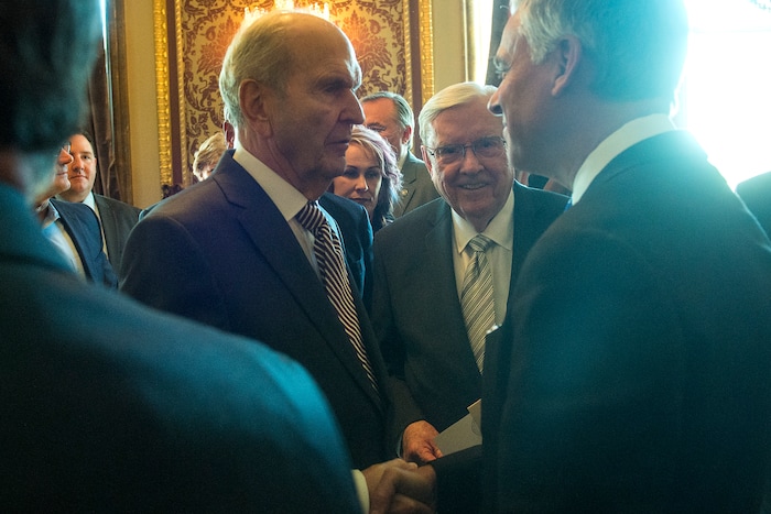 (Chris Detrick  |  Tribune file photo)  Jon M. Huntsman, Jr., U.S. Ambassador to Russia, meets with Russell M. Nelson, President of the Quorum of the Twelve Apostles, and Elder M. Russell Ballard, Quorum of the Twelve Apostles, during an Ambassadorial Swearing in Ceremony at the Utah Capitol in 2017.
