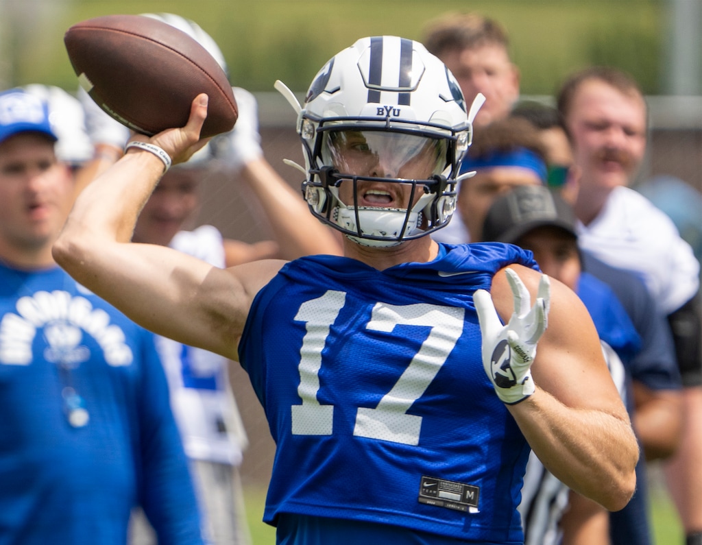 (Rick Egan | The Salt Lake Tribune)  Quarterback Jacob Conover runs a play during a scrimmage, on day 1 of BYU football Fall Camp, on Thursday, Aug. 4, 2022.