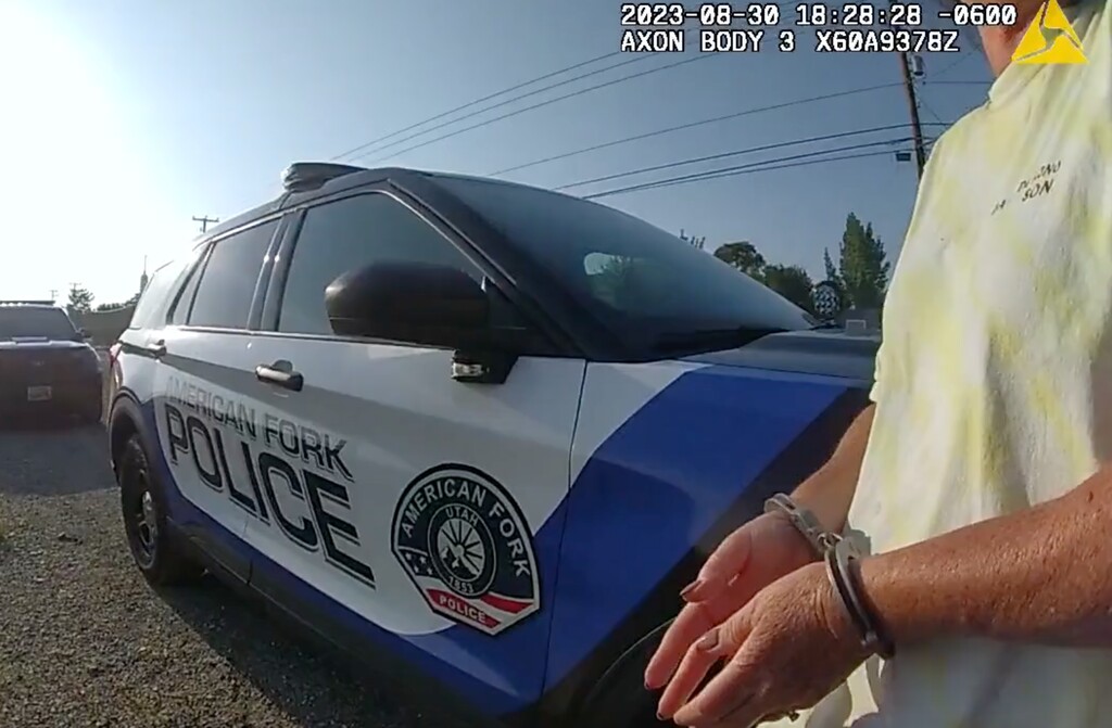 (Screenshot via American Fork Police) Police body camera footage shows officers temporarily detaining a coworker of Ruby Franke, after two of Ruby Franke's daughters were found at the coworker's home on Aug. 30, 2023, the day Ruby Franke was arrested and charged with child abuse.