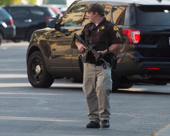 (Rick Egan  |  The Salt Lake Tribune)   Police stand by as swat teams search buildings on Rio Grande Street for a suspect that fired shots at a police officer,  Wednesday, Sept. 5, 2018.


